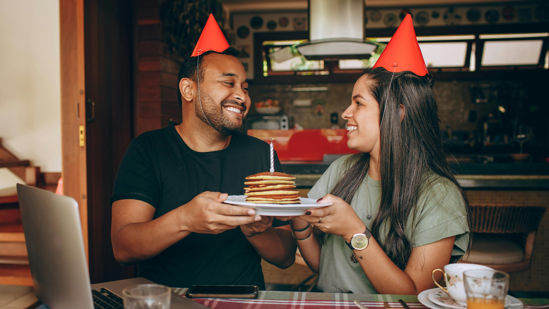 couple enjoying date night at home with pancakes